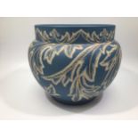 A Langley Ware Jardinière incised and gilded with sgraffito leaves to a dark turquoise ground