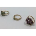 Three assorted 9ct gold rings set with semi-precious stones, one set with 9 Alexandrites, gross