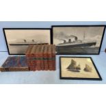 A monochrome framed print of the passenger liners Queen Mary, 29x49cm, and another of Queen