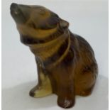 A Lalique amber glass figure of seated bear, ‘Nouria Bear’, with etched mark to base, 8cm tall