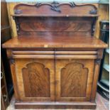 A mahogany chiffonier with shaped raised back carved with acanthus leaves, pair of pulvinated