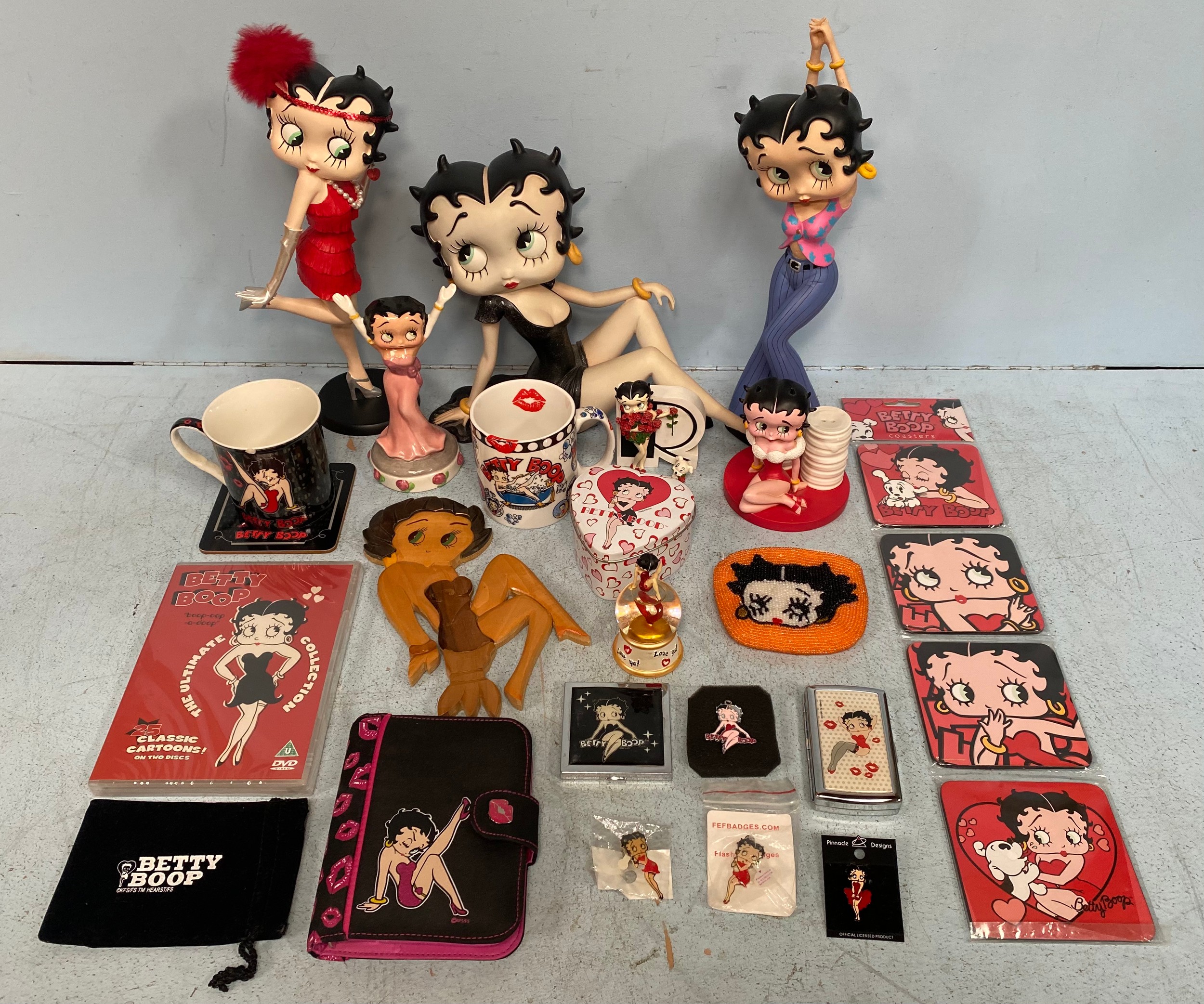 Betty Boop collectables including two King Features Syndicate figurines, one in red flapper dress