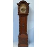 A Victorian later-carved eight-day longcase clock, with German D.R.P. three-train movement