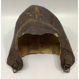 A WWII US Navy pilot's brown leather flying helmet/cap, with sheeps wool lining, (a/f)