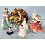 Eight hand-painted porcelain figures of ladies, comprising a Franklin Mint Victoria & Albert
