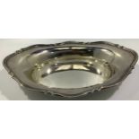 An Art Deco period oval silver bread basket with shaped rim, Sheffield, 1930, maker’s mark for