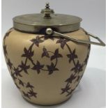 A Langley Ware pottery biscuit barrel by Mary Helen Goodyer, of globular form, incised and carved