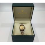 A ladies 18ct yellow gold and stainless steel 'Rolesor' Rolex Datejust wristwatch, the gold