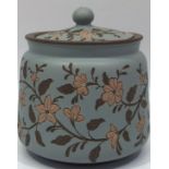 A Langley Ware art pottery tobacco jar and cover, by Mary Helen Goodyer, c1890, of cylindrical form,