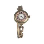A ladies 9ct gold half hunter wristwatch, on 9ct gold expandable bracelet, pink enamelled outer