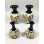 Two pairs of Lovatts Langley Mill pottery vases, 'sgraffito Blossom,' to combed beige slipware