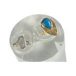 An 18ct Egyptian gold ring, set with a pear-shaped cabochon blue stone, weighs 2.9 grams, finger