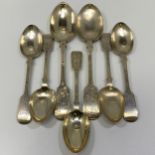 Four Edwardian silver fiddle-pattern dessert spoons with bright-cut decoration, London, 1903-04,