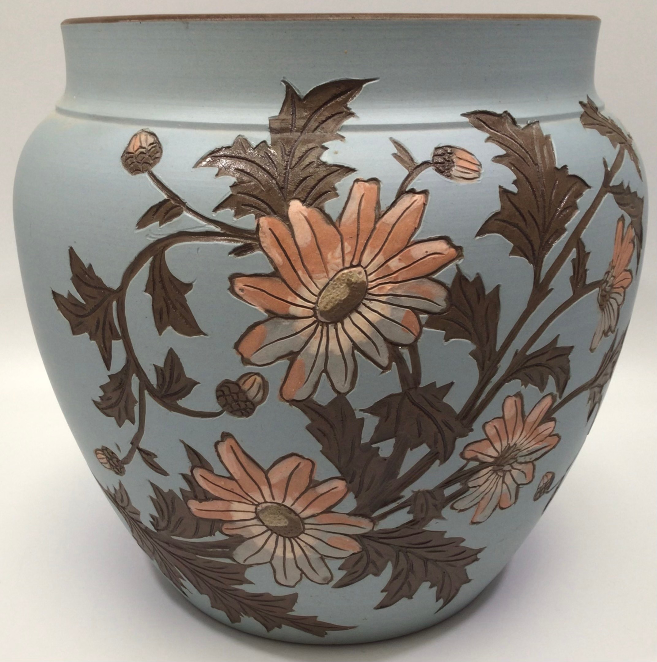 A Langley Ware Pottery Jardiniere, c1883-1890, incised and carved in 'Dog Roses' pattern, painted in