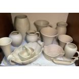Fifteen various Lovatt's 'Cream Vellum' glazed pottery jugs and vases. (13)
