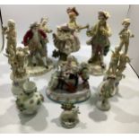 A Meissen porcelain figure group of a couple and a child, the man with blue mask, together with a