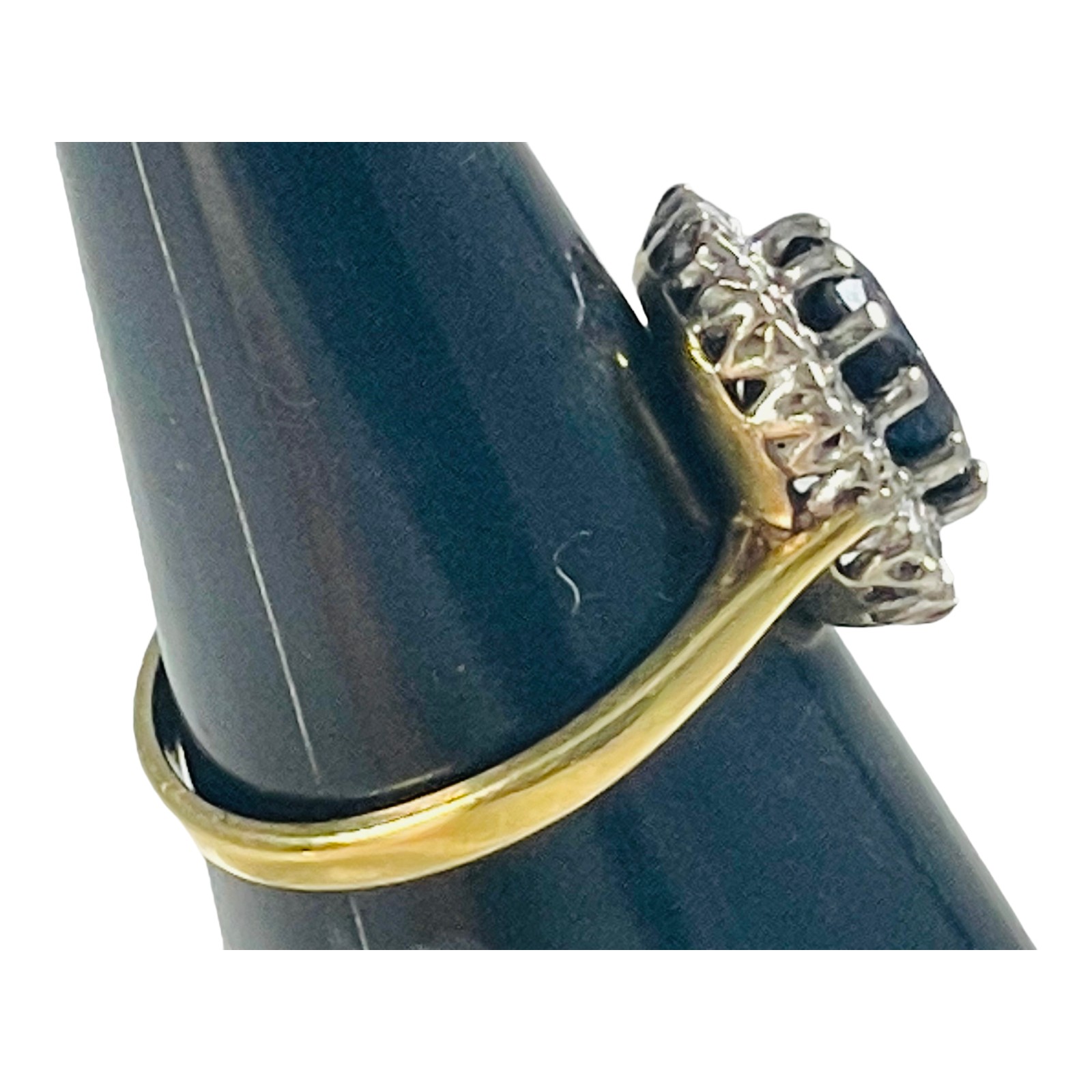 An 18ct yellow gold sapphire and diamond dress ring, set with an oval shaped sapphire to the centre, - Image 3 of 5