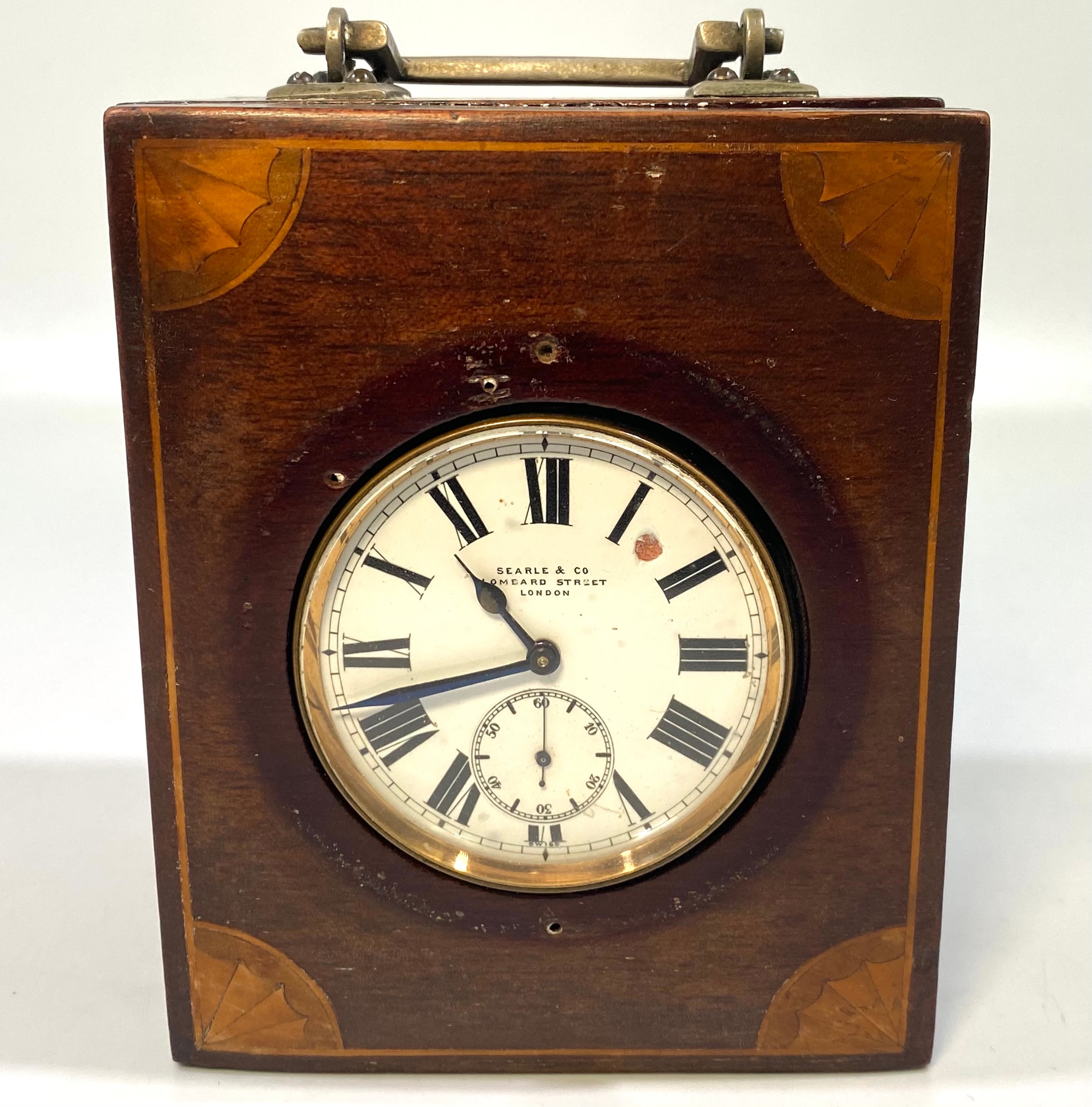 A white-metal cased open-faced Goliath pocket watch by Searle & Co, Lombard Street, London, the