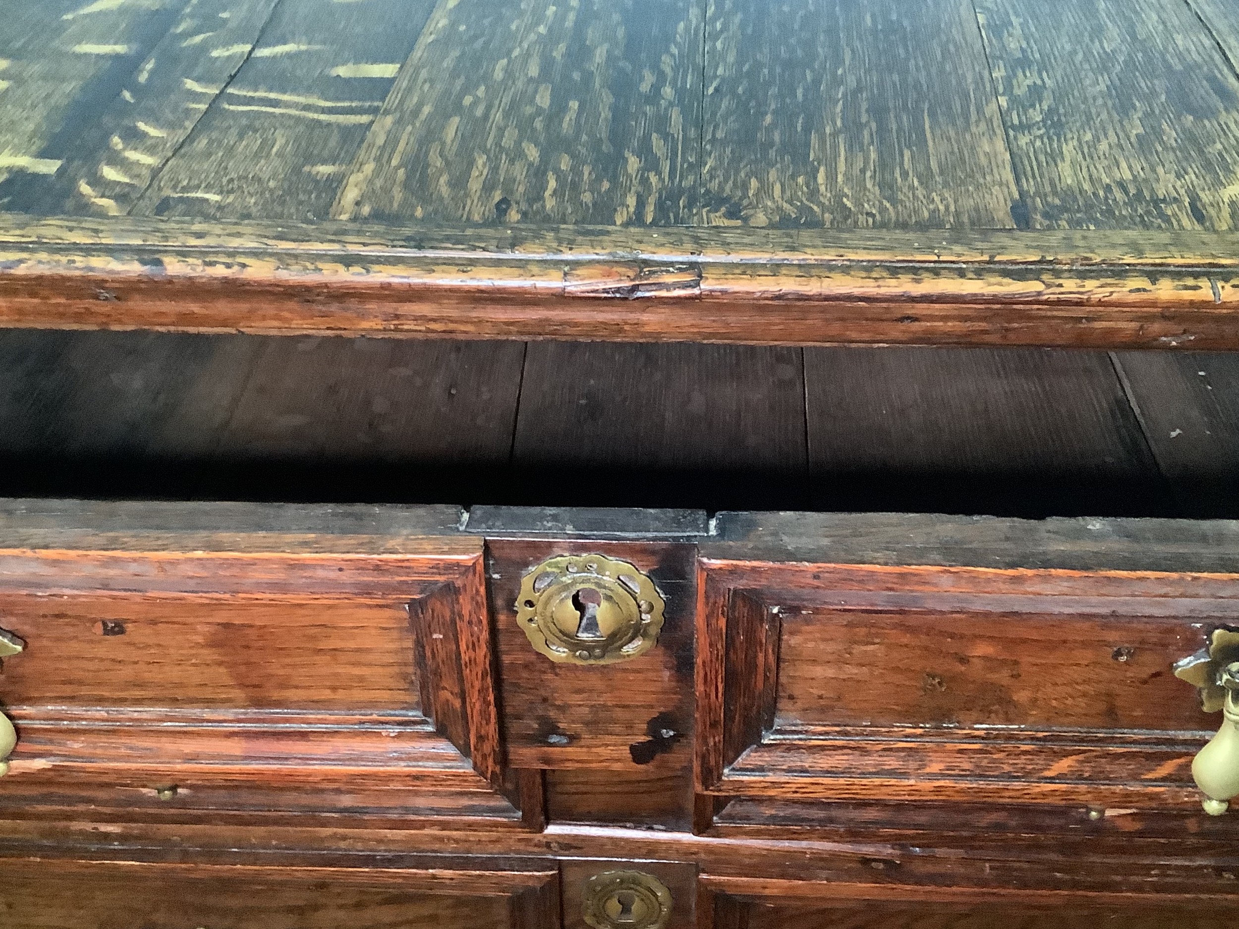 A 17th century oak chest of four long, graduated drawers with panelled fronts, brass drop pulls - Image 2 of 2