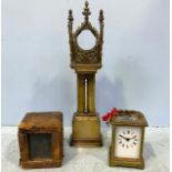 A Victorian brass pocket watch stand in the form of a long case clock with inset thermometer to