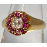 An 18ct yellow gold Victorian ring, set with an oval shaped Victorian cut diamond to the centre,