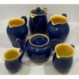 A vintage Denby Cottage blue glazed teapot, coffee pot and four graduated jugs (6)