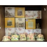 Eleven various medium sized hand-painted Lilliput Lane model cottages including ‘Orchard Farm
