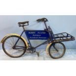 A vintage Raleigh Butchers / Grocers bike with front open tubular metal rack, central
