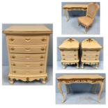 A modern cream and gold painted French style chest of five short drawers, a dressing table with