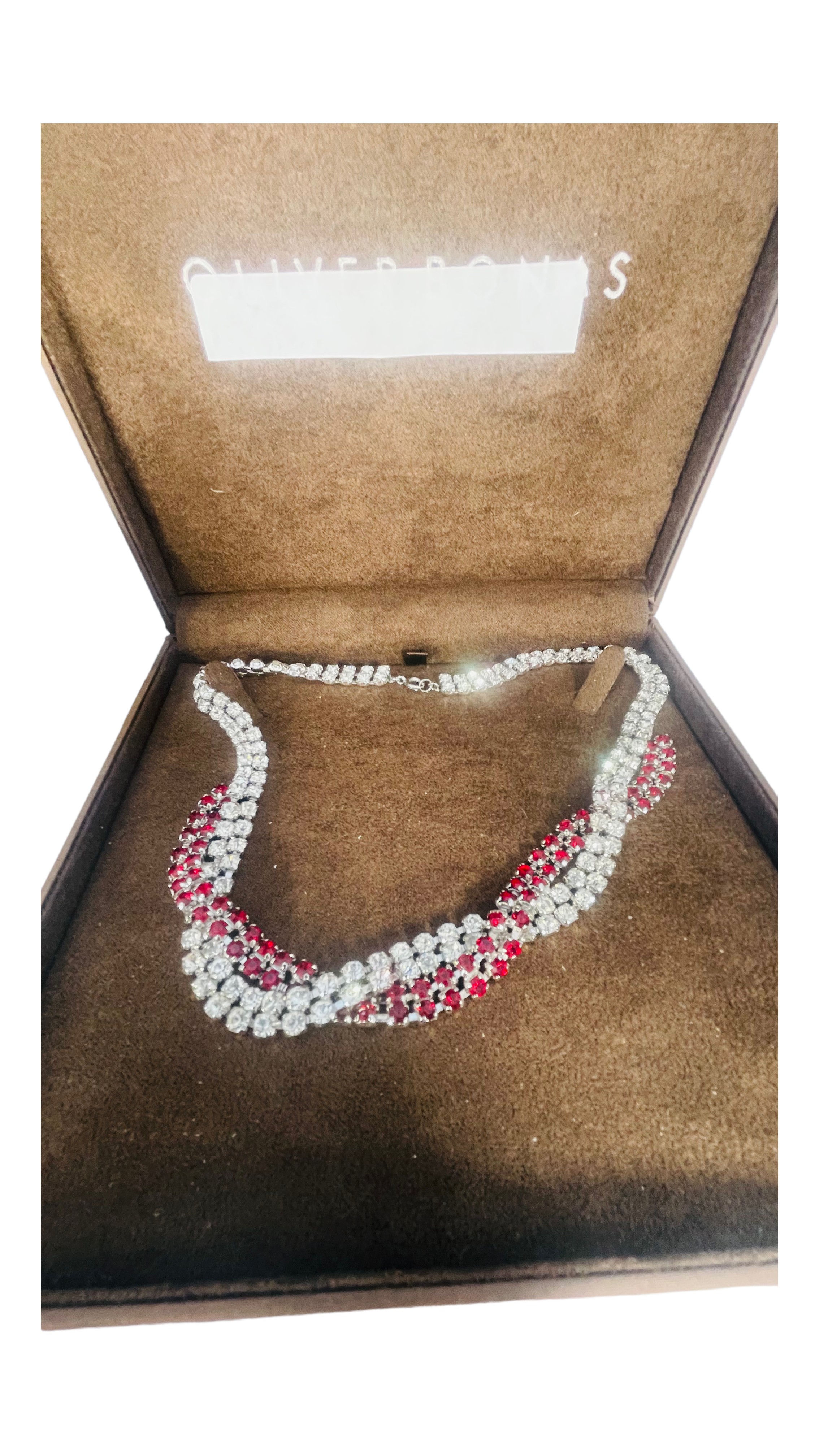 A large quantity of silver and costume jewels, including a grey and black ceramic necklace, pink and