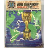 A 1966 Jules Rimet World Cup tournament programme, signed to page 29 (England), by thirteen of the