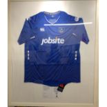 A framed and mounted 'Portsmouth FC FA Cup shirt signed by the 1st team' replica Portsmouth FC