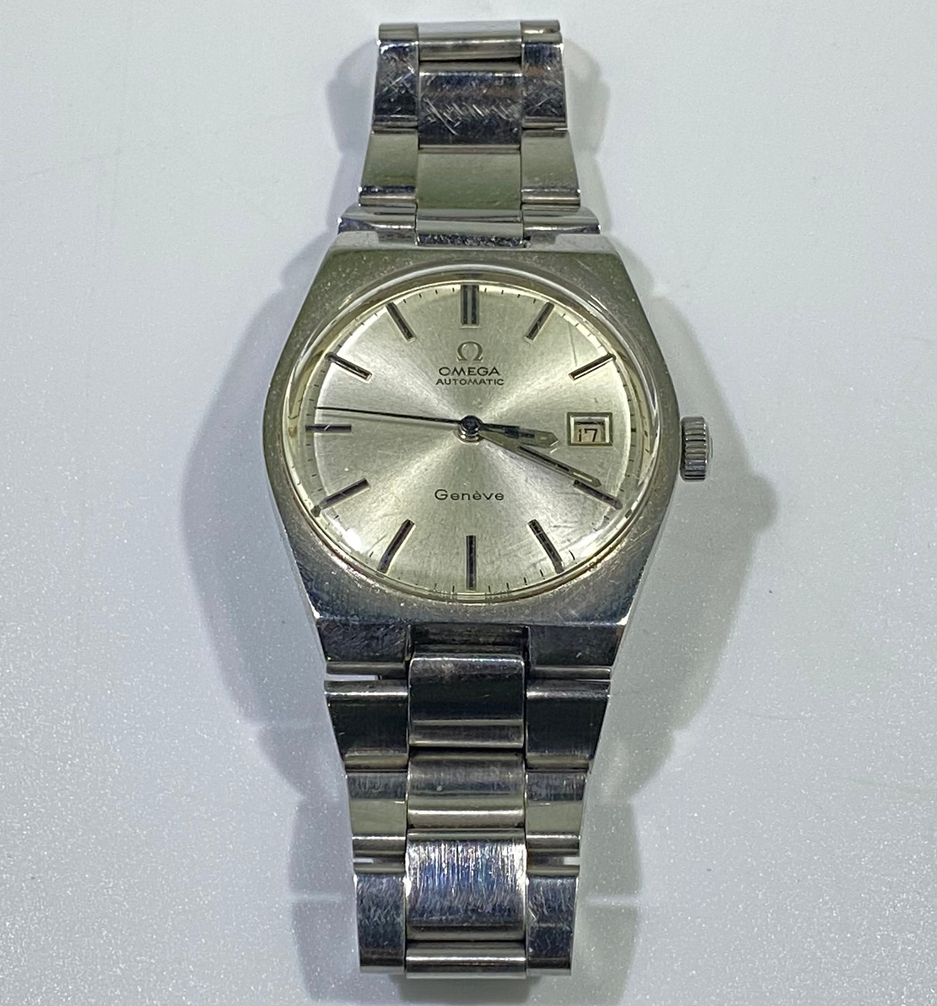 A gents stainless steel Omega Automatic Geneve wristwatch, c.1970’s, the circular silvered dial with