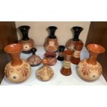 Eleven pieces of Lovatt & Lovatt period 'stencilled' ware, including black and brown glazed vase