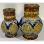 Two Doulton Lambeth stoneware bulbous jugs, both commemorating 60 years of Queen Victoria on the