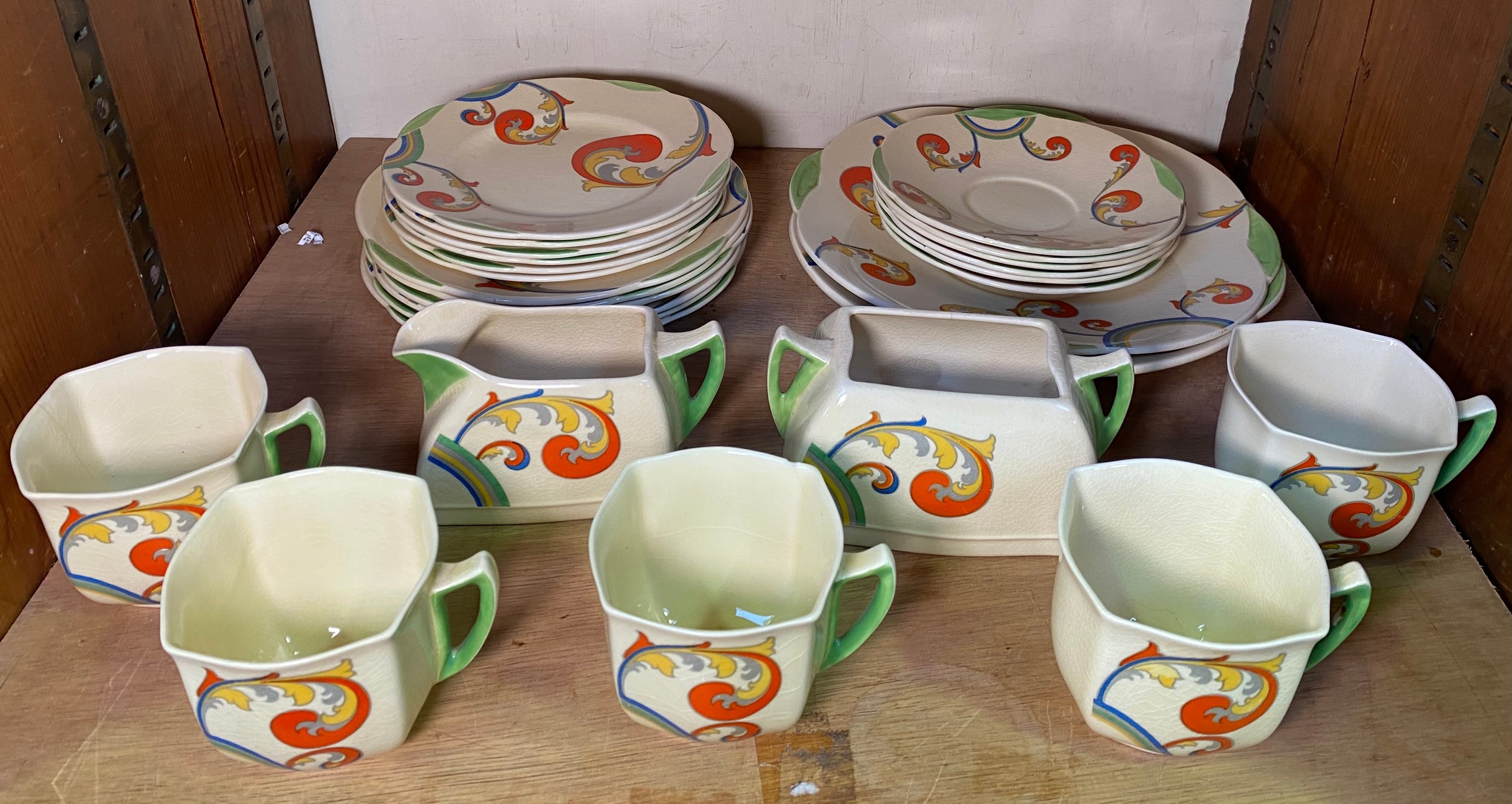 An Art Deco Royal Doulton ‘Syren’ D.5102 pattern part tea set, comprising five cups and six saucers,