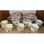 An Art Deco Royal Doulton ‘Syren’ D.5102 pattern part tea set, comprising five cups and six saucers,