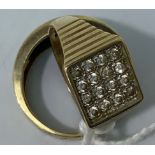 A 9ct gold gents ring set with four rows of four white stones, together with another 9ct gold