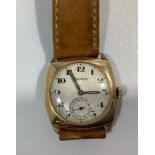 A 9ct gold cased wristwatch, c.1940’s, the circular silvered Rolex dial with Arabic numerals
