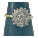 An 18ct yellow gold diamond cluster ring, set with 24 x round brilliant cut diamonds, estimated
