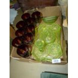A quantity of coloured glass including a lime green dressing table set, nine red glasses etc.
