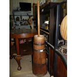 A wooden Butter Churn.