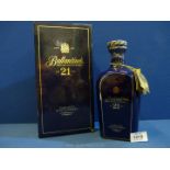 A presentation cased Wade decanter of Ballantines 21 year old Rare Aged Scotch Whisky (unopened)