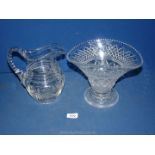 A heavy quality 19th century 4 pint glass jug having finger cut rim and handle (a/f with crack) and