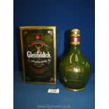 A boxed 'Single Malt Glenfiddich aged 18 years Scotch Whisky' decanter (green box).