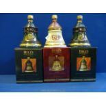 Three Wade 'Bell's Extra Special Old Scotch Whisky Christmas' boxed decanters, '1994',