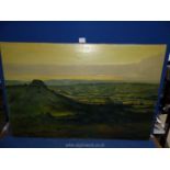 An Oil on canvas of an extensive partially sunlit landscape reminiscent of the Welsh Marches,