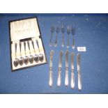 Six silver handled butter knives, five epns pastry forks and a cased set of epns teaspoons.