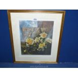 A limited edition framed Print depicting a still life of flowers (no. 120/1000), initialed C.T.