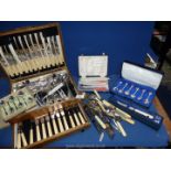 A canteen of silver plated cutlery, boxed butter knives, box of Christmas teaspoons etc.